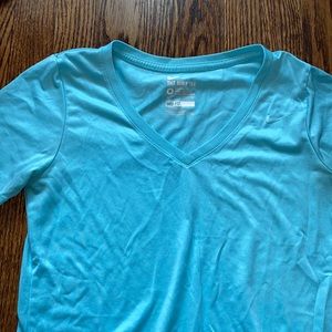 Light turquoise Nike Dri-fit top in size medium